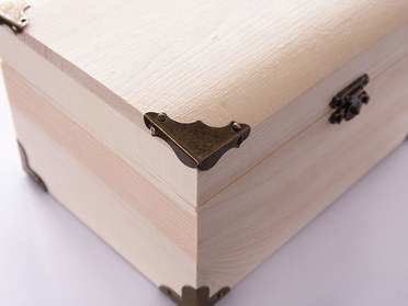 Wooden keepsake chest with dark fittings